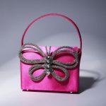 Fia Crystal Butterfly Clutch In Hot Pink